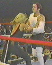 Andy wrestling a woman